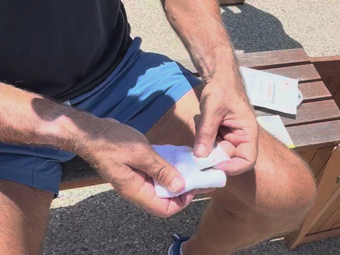 Sliding a rosin insert into the pocket on a Swips sweatband
