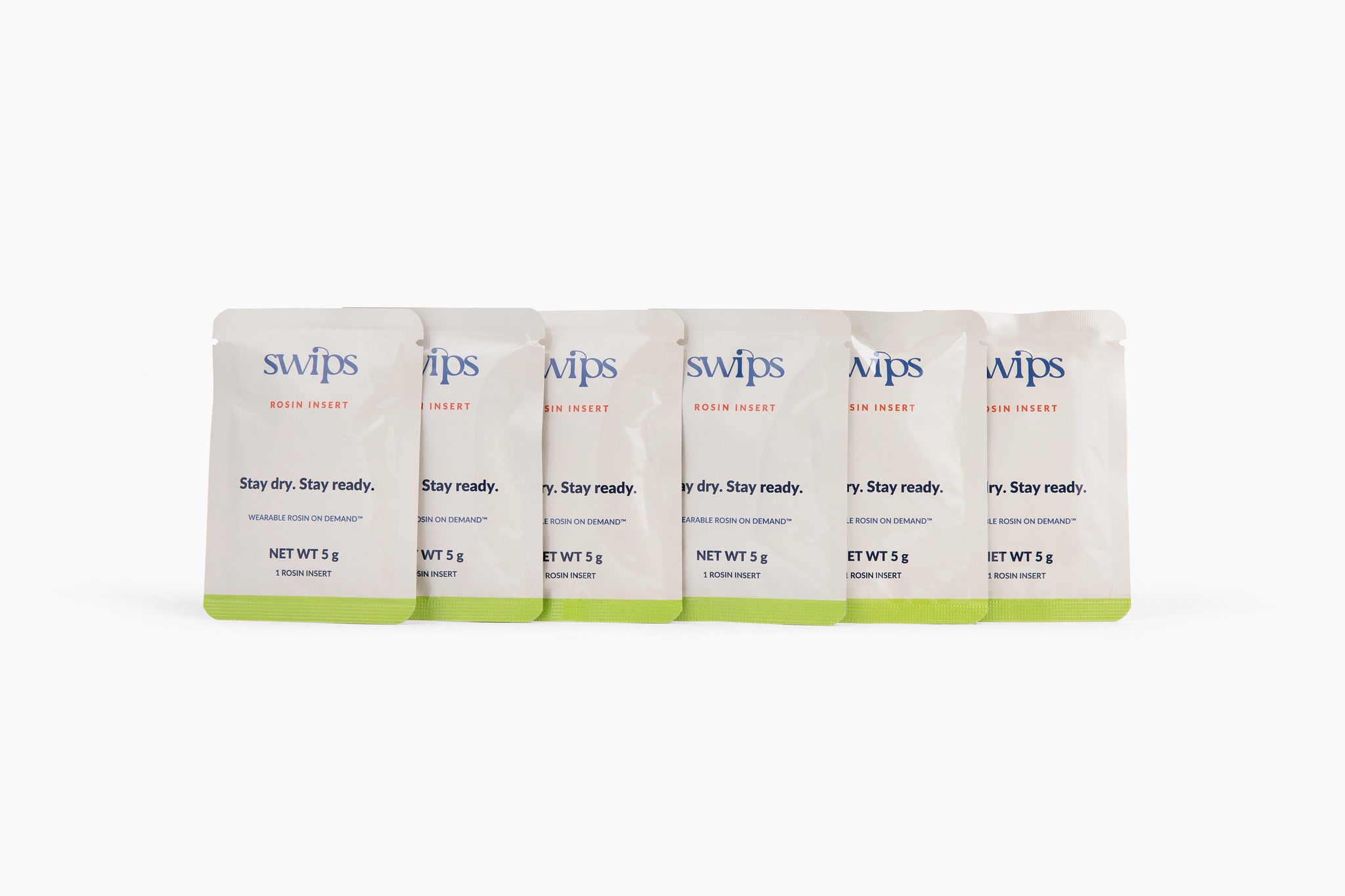 Six sealed Swips rosin insert sachets in a row, the Rosin Insert Refills 6-Pack